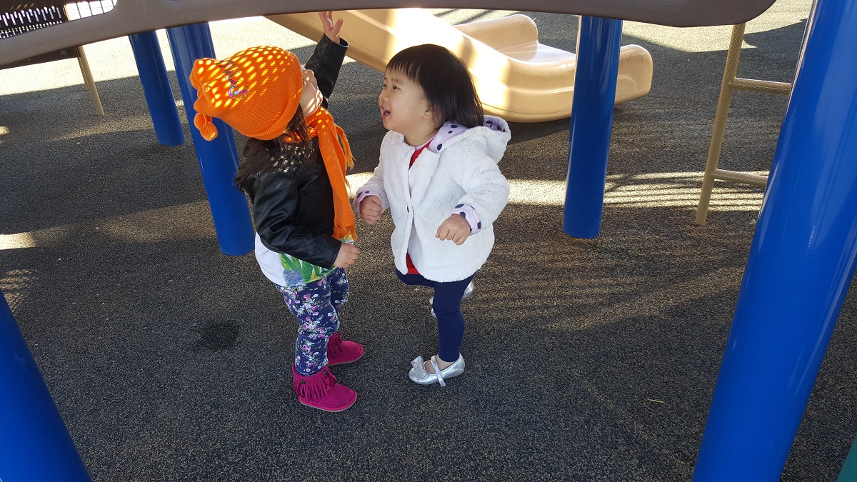 Hailey plaing with friend at the park